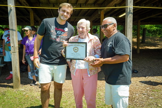 Jack Richardson presenting a community award in Mashpee