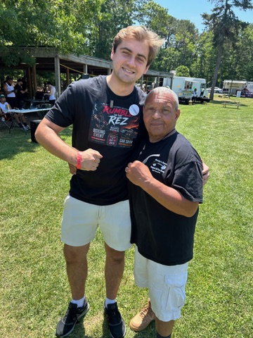 Jack Richardson with a friend at a community gathering